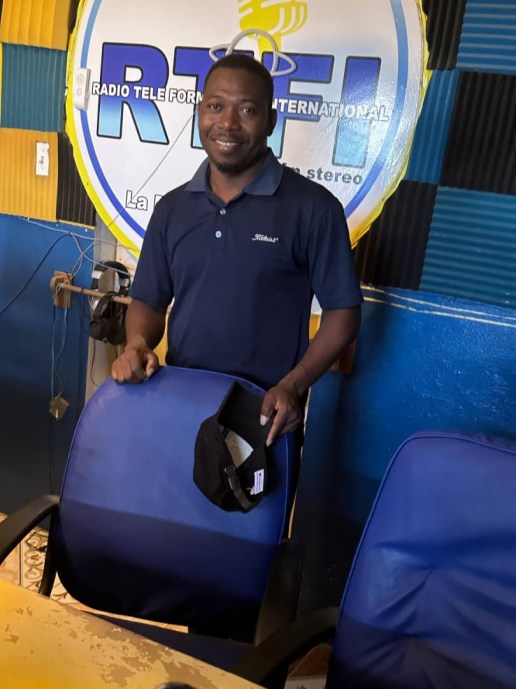 Frantz on the radio in Haiti
