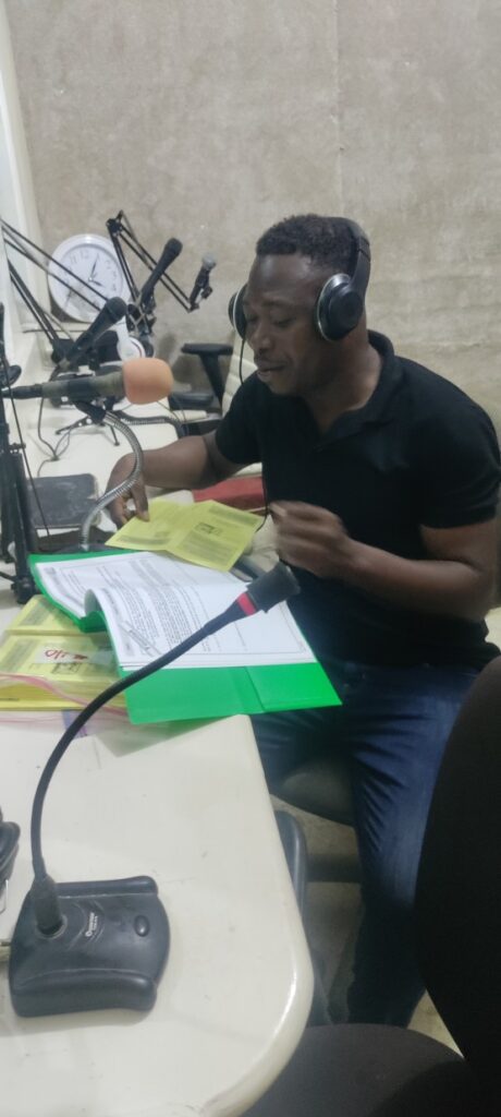 Frantz on the radio in Haiti