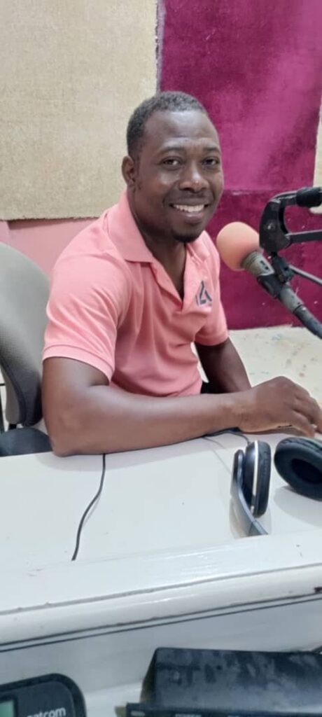 Frantz on the radio in Haiti